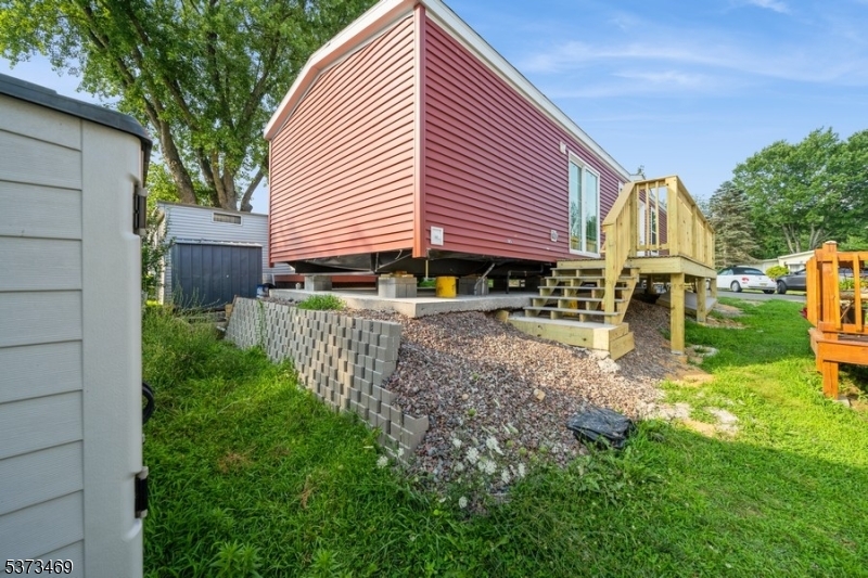 195 West Main Street, Unit 22 Chester, NJ 07930 - Photo 20 of 23 a view of backyard of house