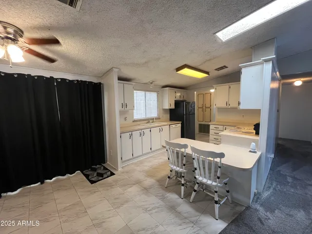 $64,900 | 11596 West Sierra Dawn Boulevard, Unit 204, Surprise, AZ 85378