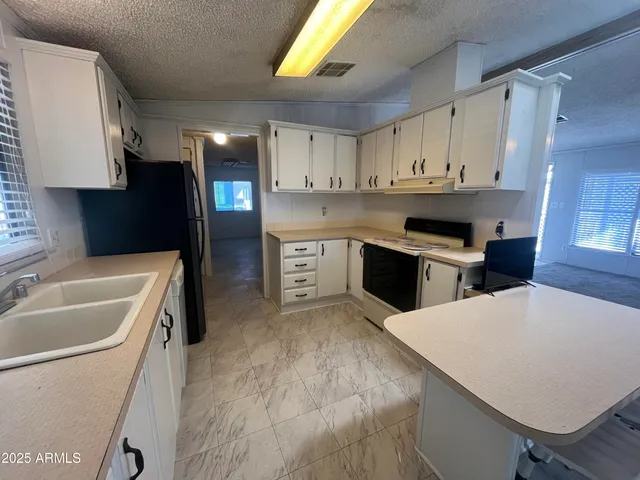 $64,900 | 11596 West Sierra Dawn Boulevard, Unit 204, Surprise, AZ 85378
