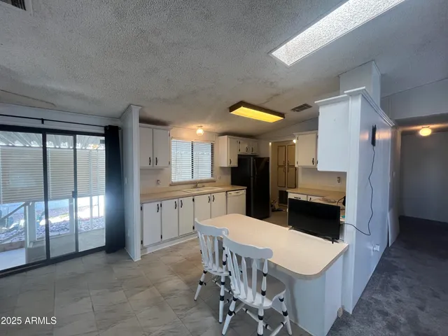$64,900 | 11596 West Sierra Dawn Boulevard, Unit 204, Surprise, AZ 85378