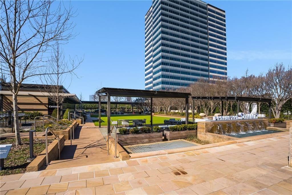 10 Perimeter Summit Boulevard, Unit 1404 Brookhaven, GA 30319 - Photo 22 of 39 a view of a swimming pool with a patio