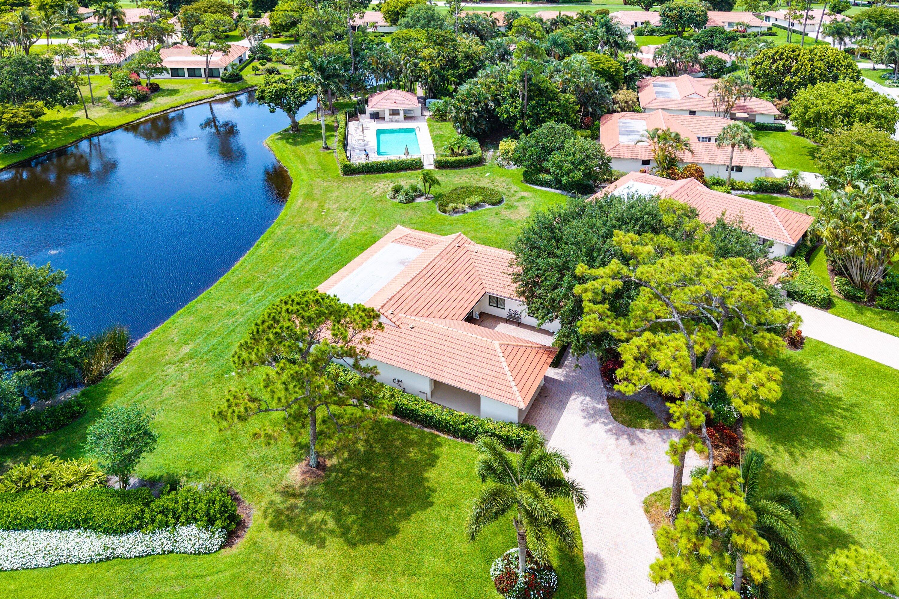4365 Shell Drake Lane Boynton Beach, FL 33436 - Photo 1 of 56 an aerial view of residential house with outdoor space and swimming pool
