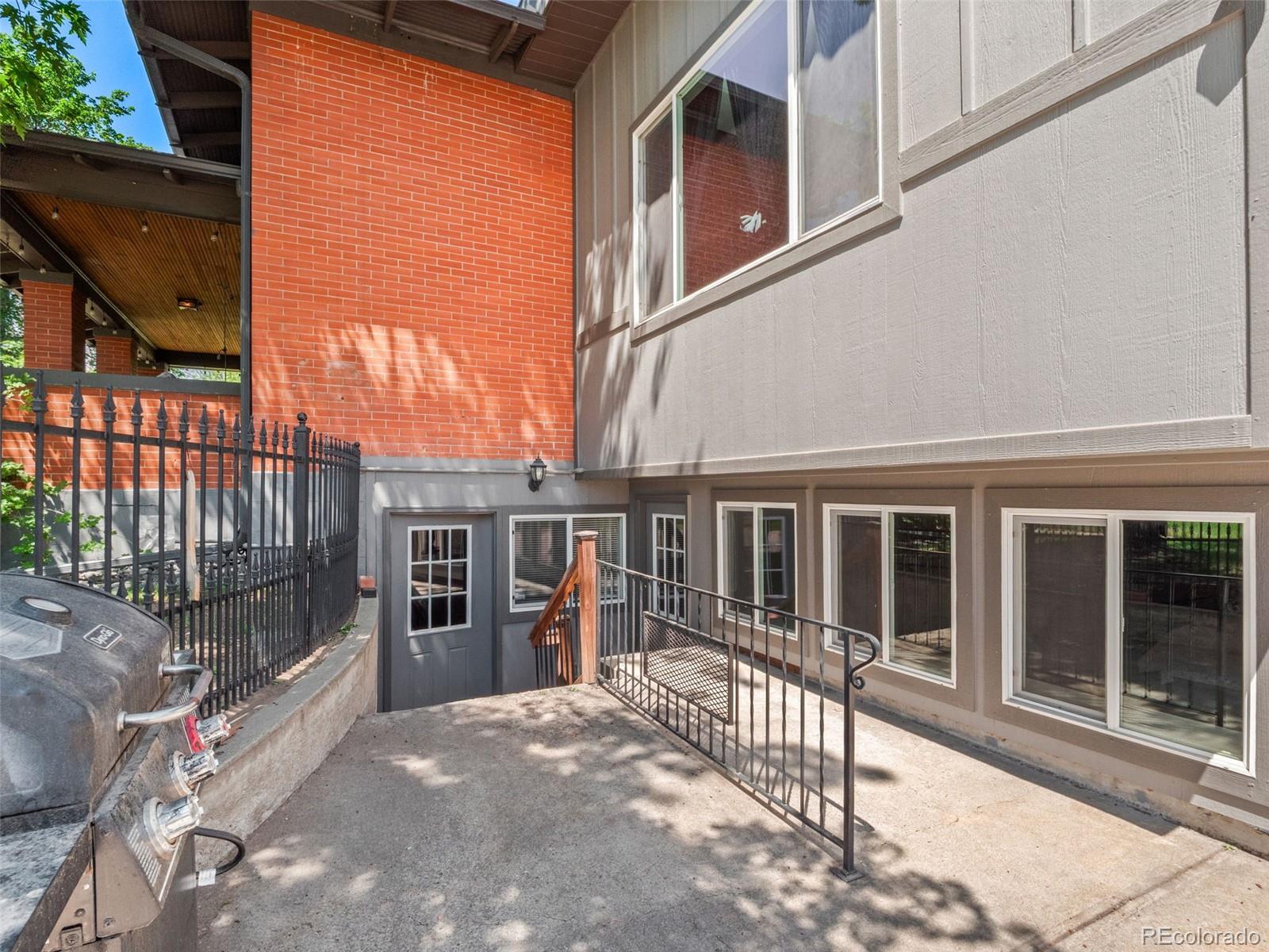 6595 West 46th Place Wheat Ridge, CO 80033 - Photo 40 of 48 a view of a house with a balcony