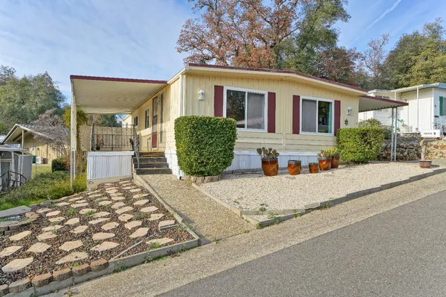 front view of a house with a patio
