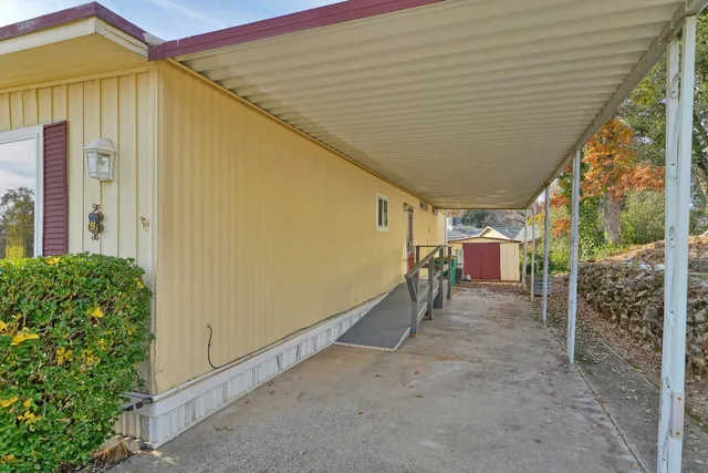 a view of a porch with furniture