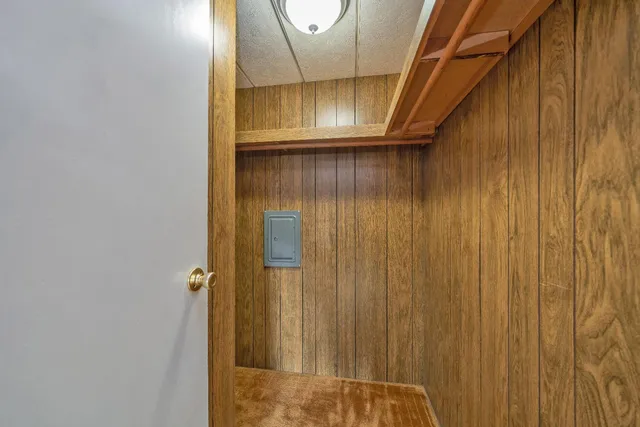 a bathroom with a toilet sink and shower curtain