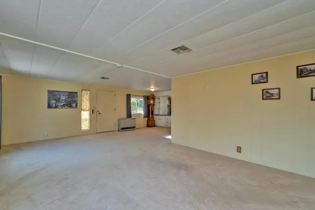 a view of empty room with front door