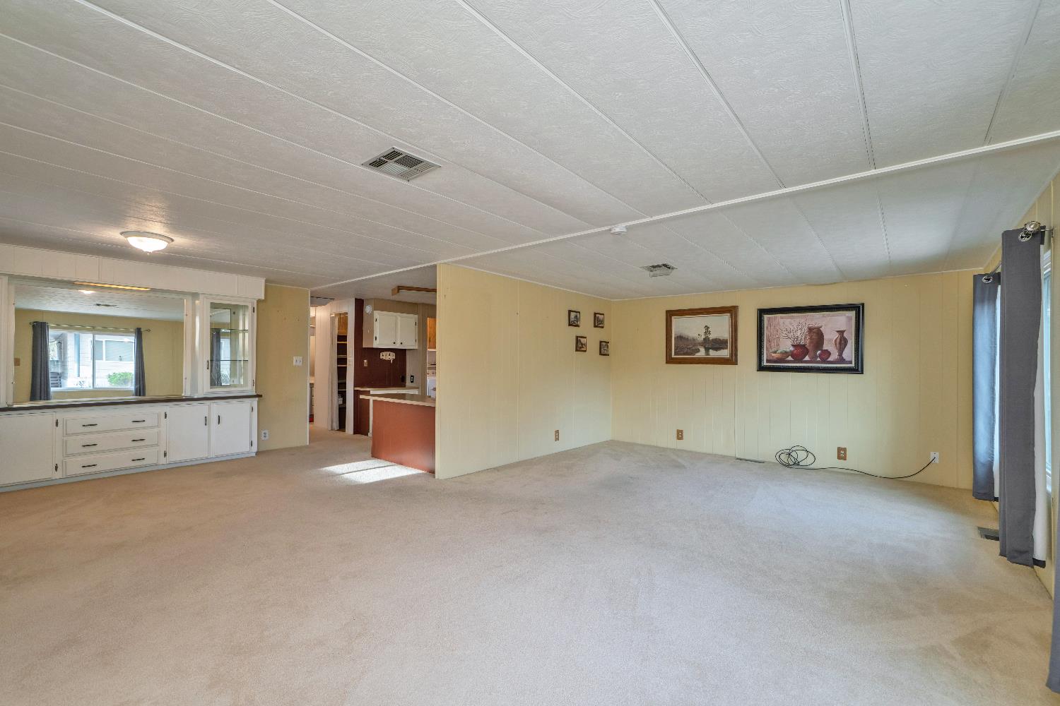 3550 China Garden Road, Unit 9 Placerville, CA 95667 - Photo 40 of 40 Open floor plan looking at large living room, dining room and peaking at the kitchen.