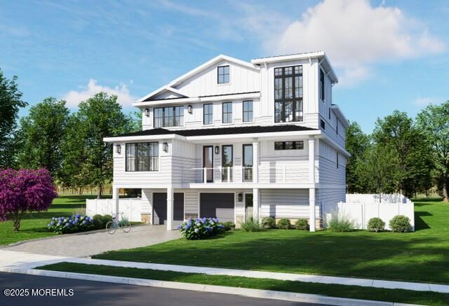 110 Parkway Point Pleasant Beach, NJ 08742 - Photo 1 of 12 a front view of a building with a garden