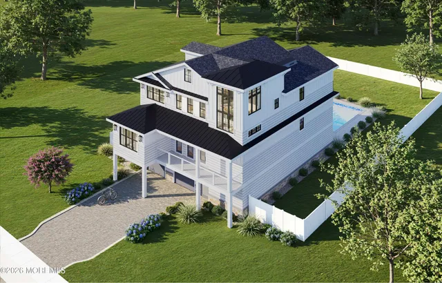 a aerial view of a house with a yard