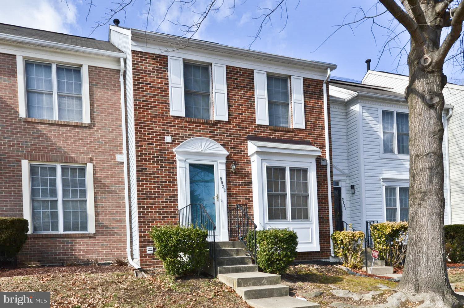 9923 Raintree Way Clinton, MD 20735 - Photo 1 of 30 a front view of a house with a yard