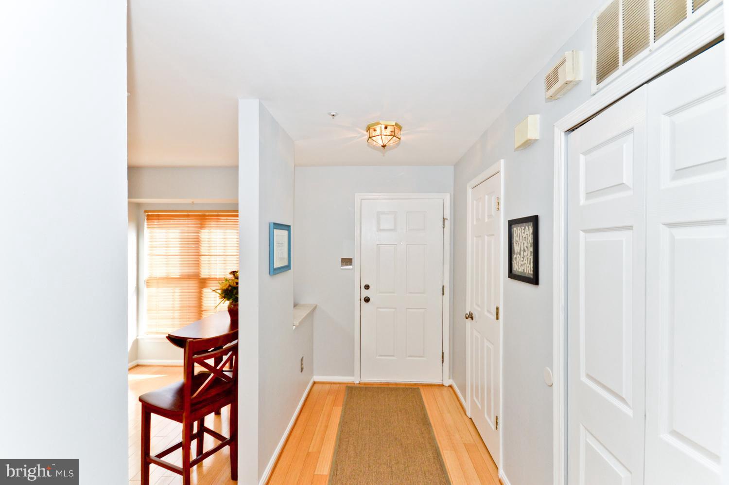 9923 Raintree Way Clinton, MD 20735 - Photo 3 of 30 a view of a hallway with seating area