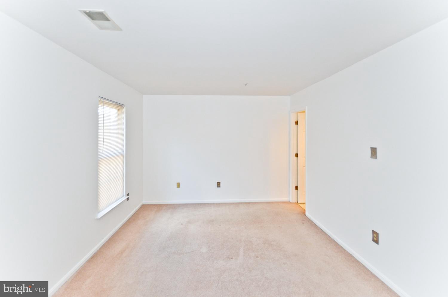 9923 Raintree Way Clinton, MD 20735 - Photo 22 of 30 an empty room with an entryway