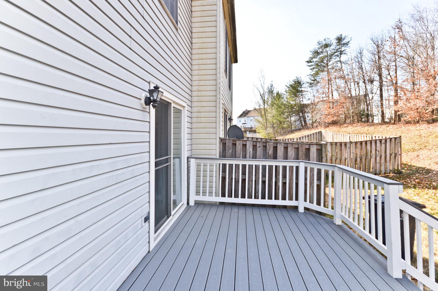 9923 Raintree Way Clinton, MD 20735 - Photo 29 of 30 a view of a wooden deck