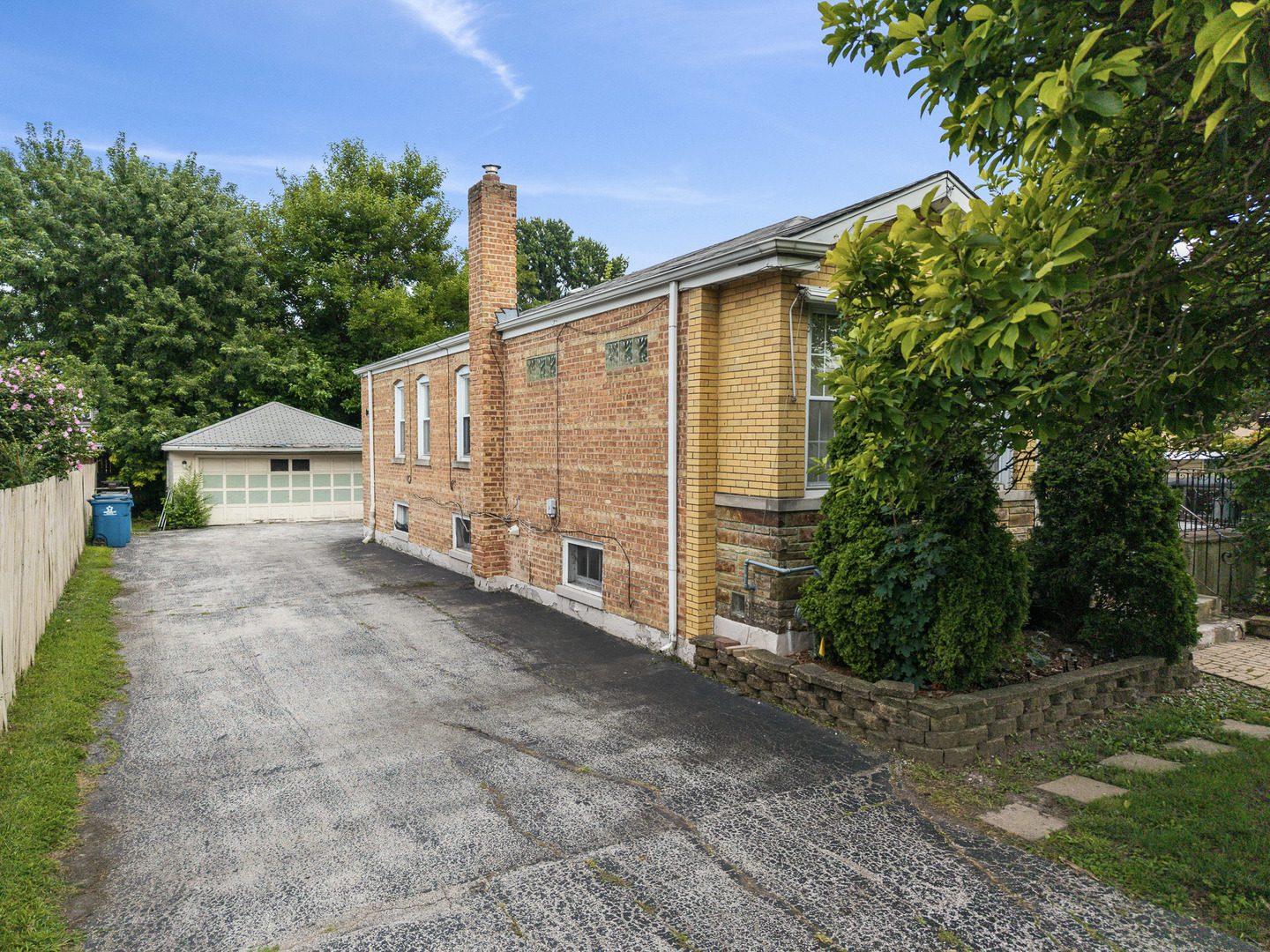 14839 Lawndale Avenue Midlothian, IL 60445 - Photo 2 of 3 a view of a house with backyard and trees