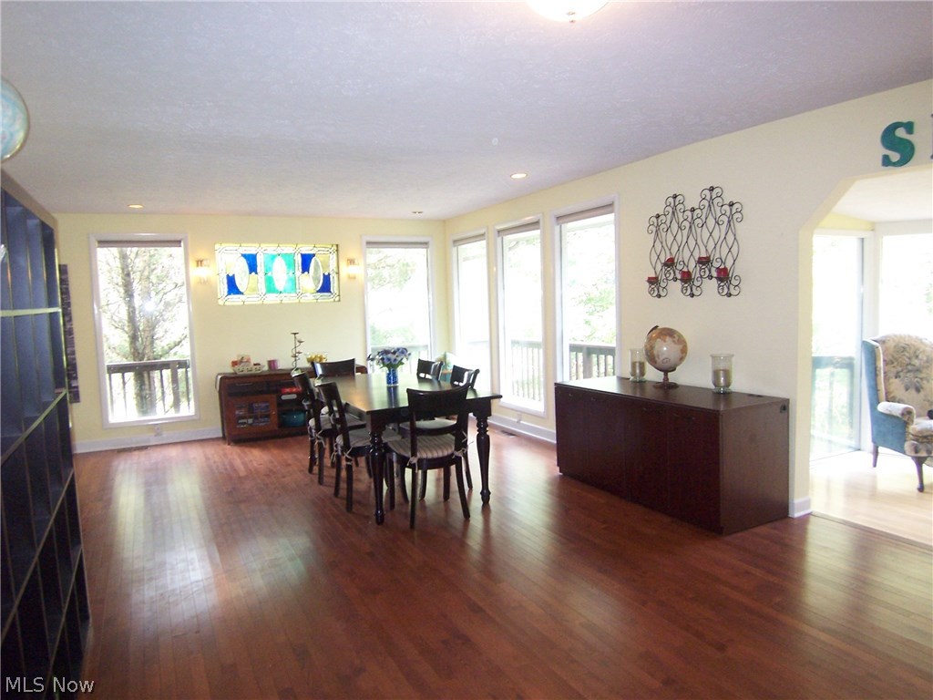 122 Rector Road Parkersburg, WV 26104 - Photo 4 of 35 Dining room is approx. 21 x 26 with hardwood floors, access to the deck and smaller sunroom.
