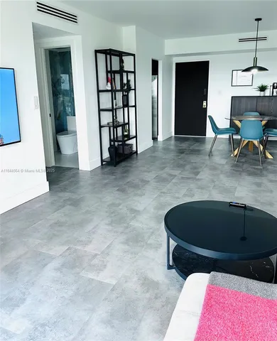 a bedroom with furniture and a couch