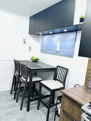 a view of a livingroom with furniture and a couch