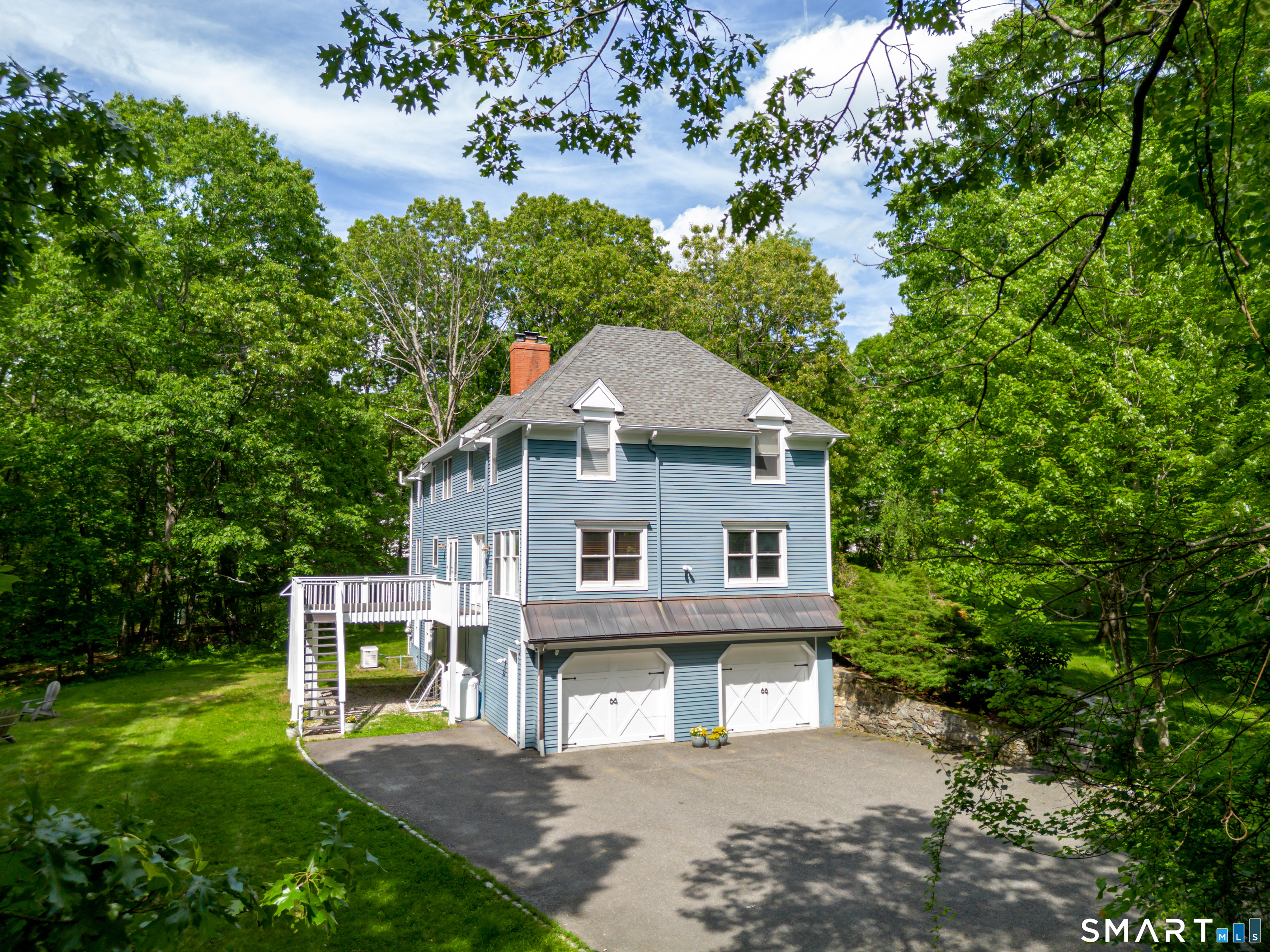 3 Partridge Trail Sherman, CT 06784 - Photo 6 of 37 a front view of a house with garden
