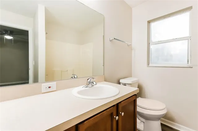 a bathroom with a sink and a toilet
