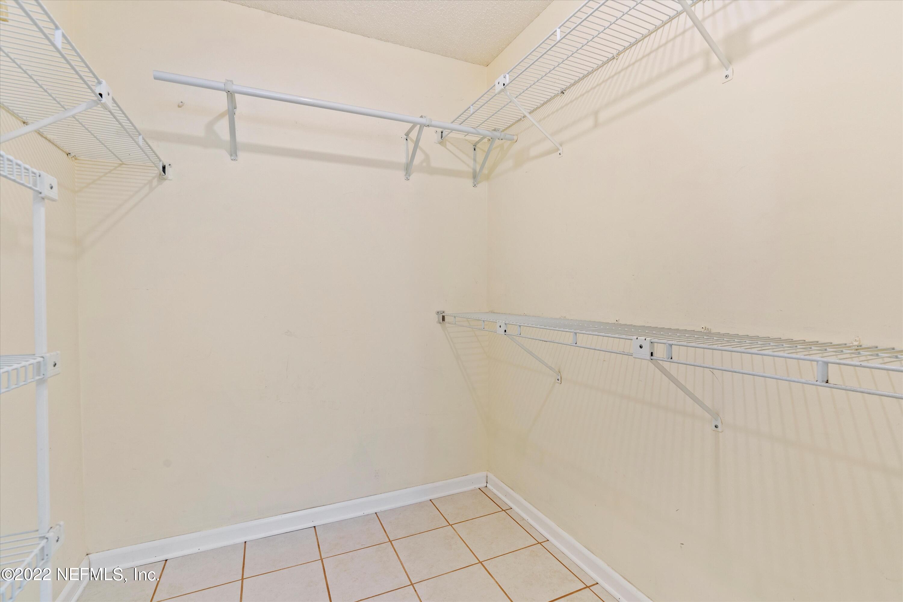 10498 Rothbury Court Jacksonville, FL 32221 - Photo 18 of 35 a view of a room with racks on the wall