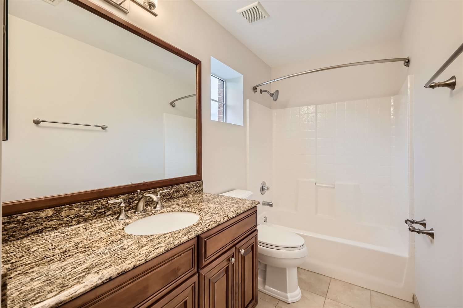 1 Charlotte Circle Elmhurst, IL 60126 - Photo 9 of 11 a bathroom with a granite countertop sink toilet and shower