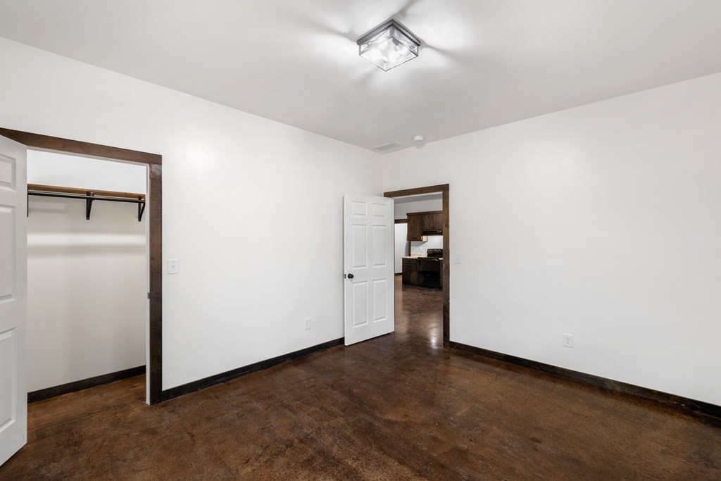 620 A Stiles Road Epworth, GA 30541 - Photo 12 of 21 a view of a room with a hallway and stairs