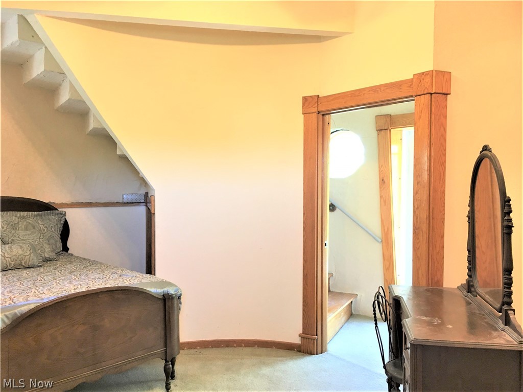 4630 Kolbe Road Lorain, OH 44053 - Photo 28 of 35 Fourth Floor bedroom to balcony and stairs to fifth floor.