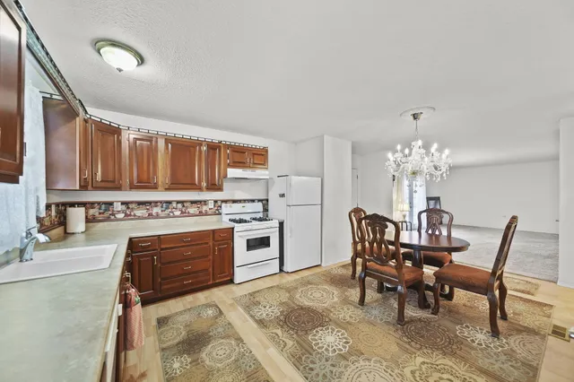 $249,900 | 14581 Glenbeigh Lane, Cement City, MI 49233