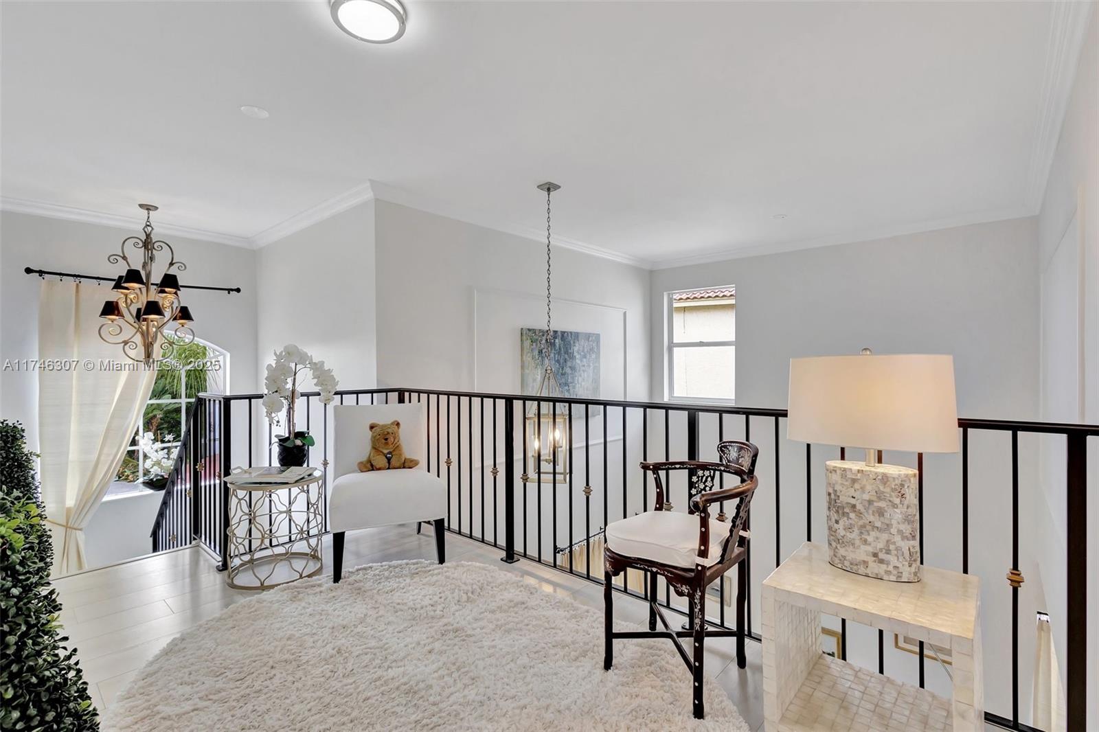 1826 Capeside Circle Wellington, FL 33414 - Photo 11 of 73 a living room with furniture and a window