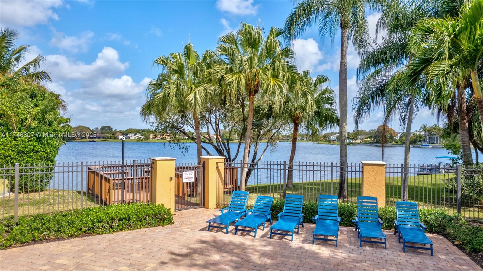 1826 Capeside Circle Wellington, FL 33414 - Photo 68 of 73 a front view of a house with garden
