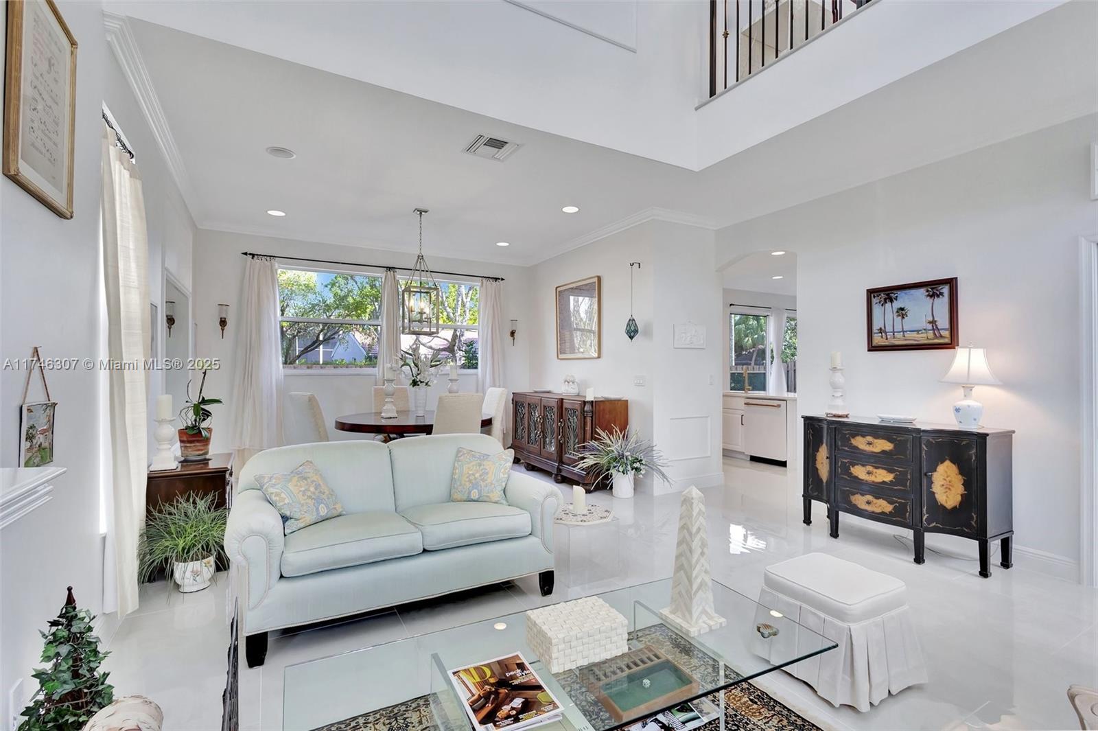 1826 Capeside Circle Wellington, FL 33414 - Photo 8 of 73 a living room with furniture and a large window