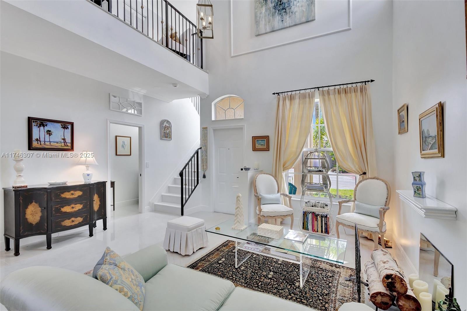 1826 Capeside Circle Wellington, FL 33414 - Photo 9 of 73 a living room with furniture and wooden floor