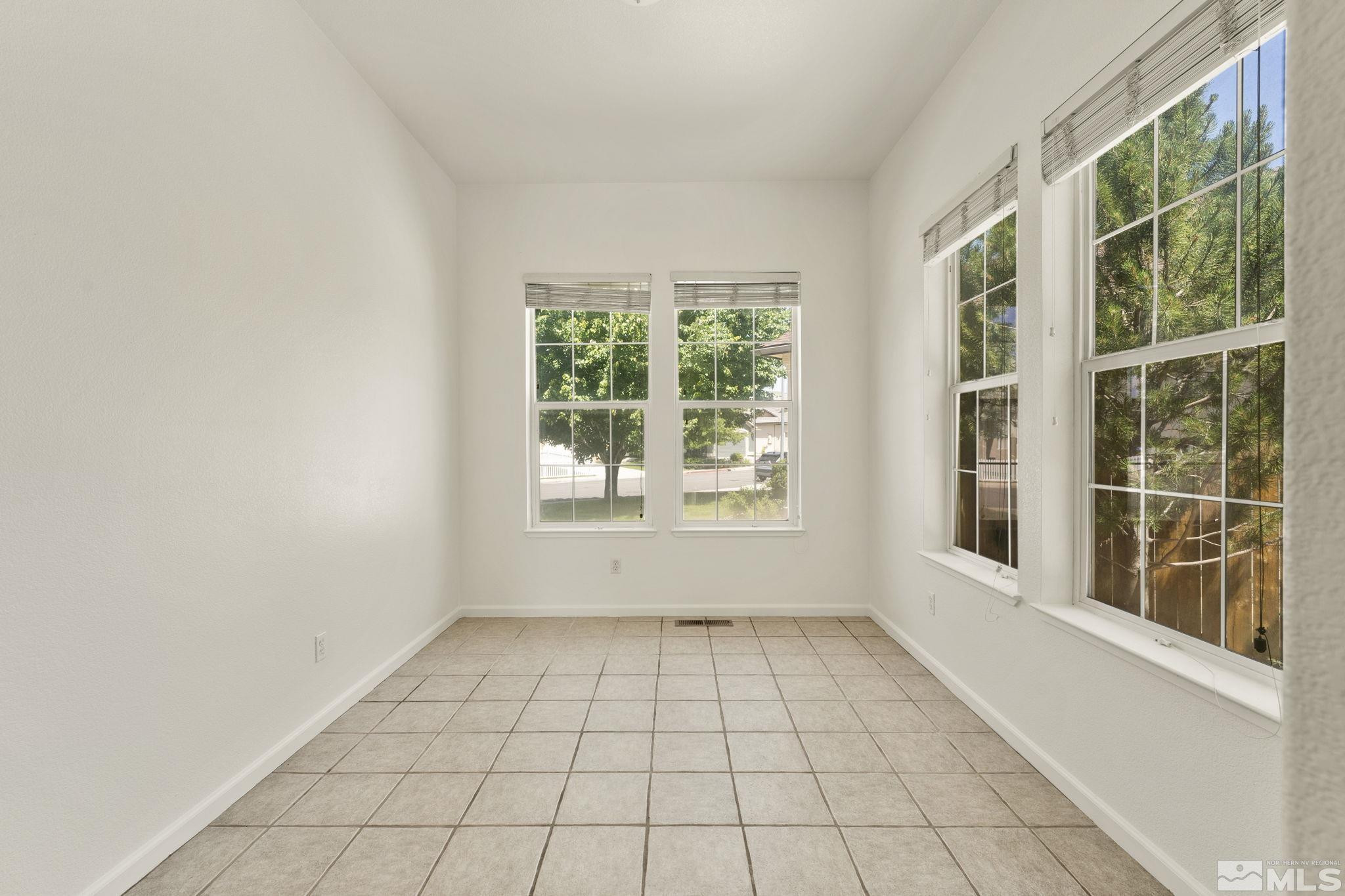 1442 Wessex Circle Reno, NV 89503 - Photo 14 of 32 a view of an empty room with a window