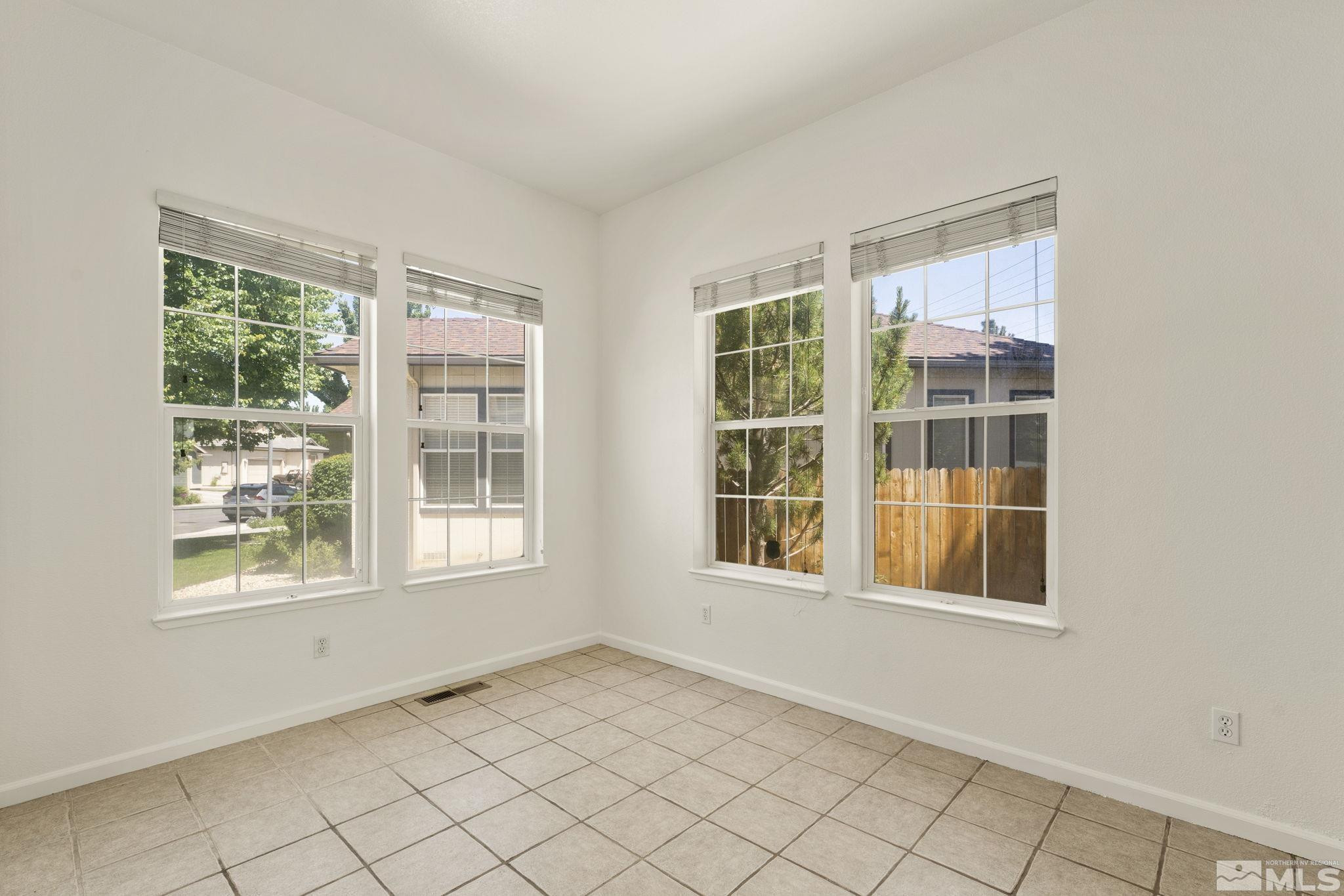 1442 Wessex Circle Reno, NV 89503 - Photo 15 of 32 an empty room with windows
