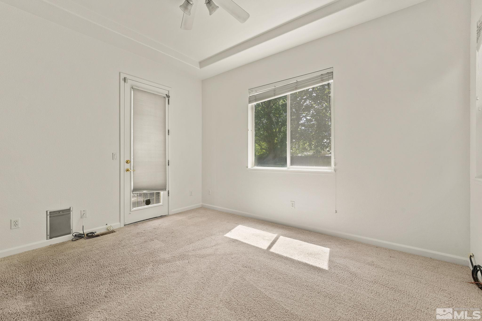 1442 Wessex Circle Reno, NV 89503 - Photo 17 of 32 an empty room with windows