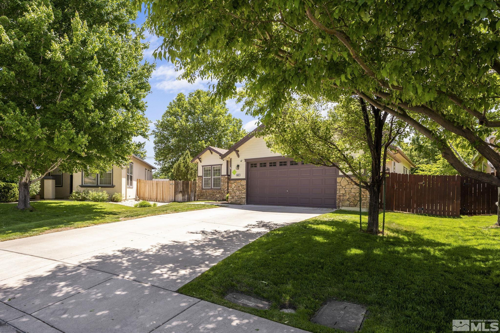 1442 Wessex Circle Reno, NV 89503 - Photo 2 of 32 a house with a tree in front of it