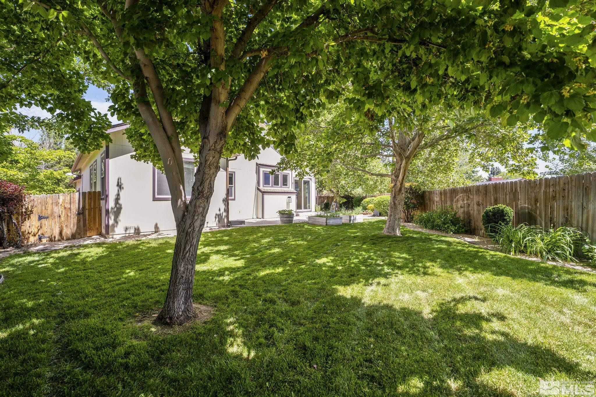 1442 Wessex Circle Reno, NV 89503 - Photo 27 of 32 a view of a house with a yard