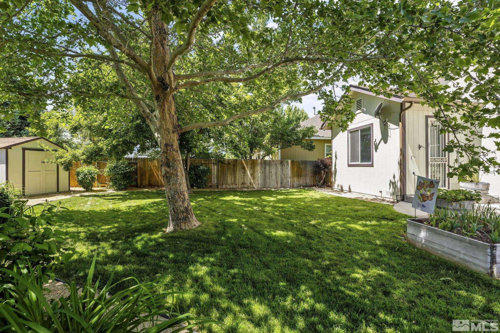 1442 Wessex Circle Reno, NV 89503 - Photo 28 of 32 a view of a house with yard and tree s