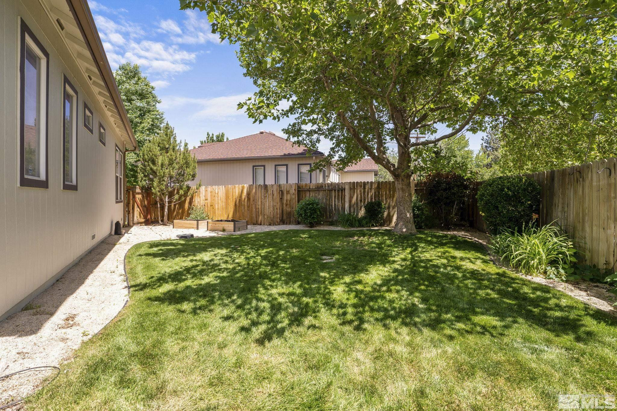1442 Wessex Circle Reno, NV 89503 - Photo 32 of 32 a front view of a house with garden