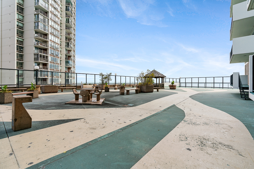 6033 North Sheridan Road, Unit 8E Chicago, IL 60660 - Photo 30 of 31 a view of residential houses with outdoor space