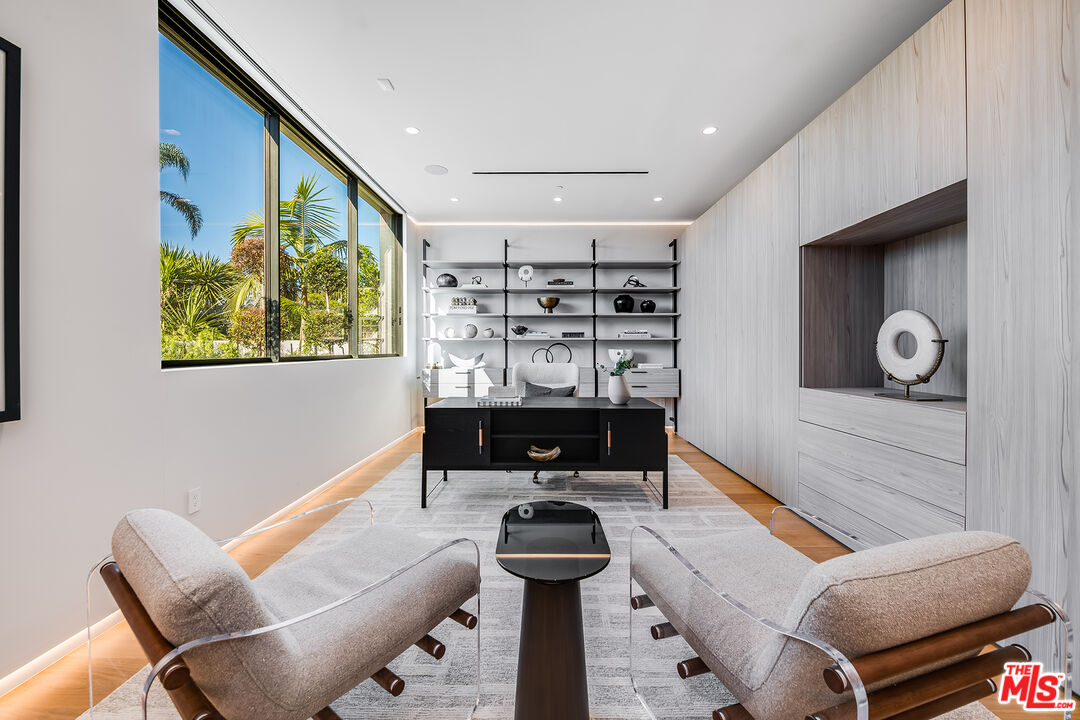 2078 Stradella Road Los Angeles, CA 90077 - Photo 21 of 37 a living room with furniture