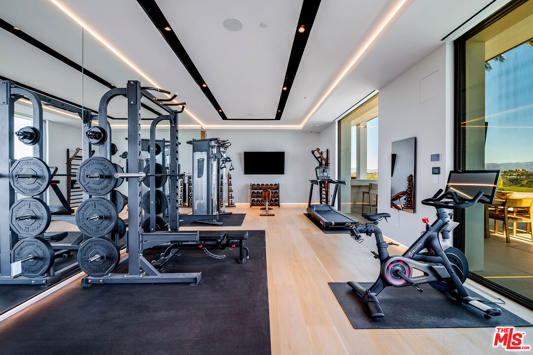 2078 Stradella Road Los Angeles, CA 90077 - Photo 27 of 37 a view of a room with gym equipment