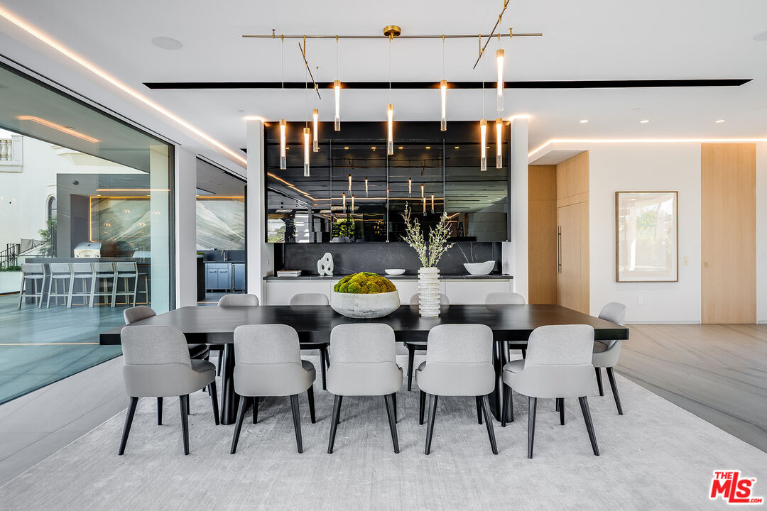 2078 Stradella Road Los Angeles, CA 90077 - Photo 10 of 37 a view of a dining room with furniture