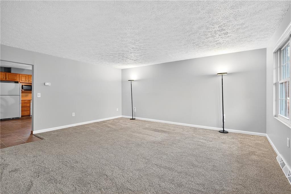 2902 Darlington Road, Unit 703 Beaver Falls, PA 15010 - Photo 18 of 37 a view of an empty room and a window