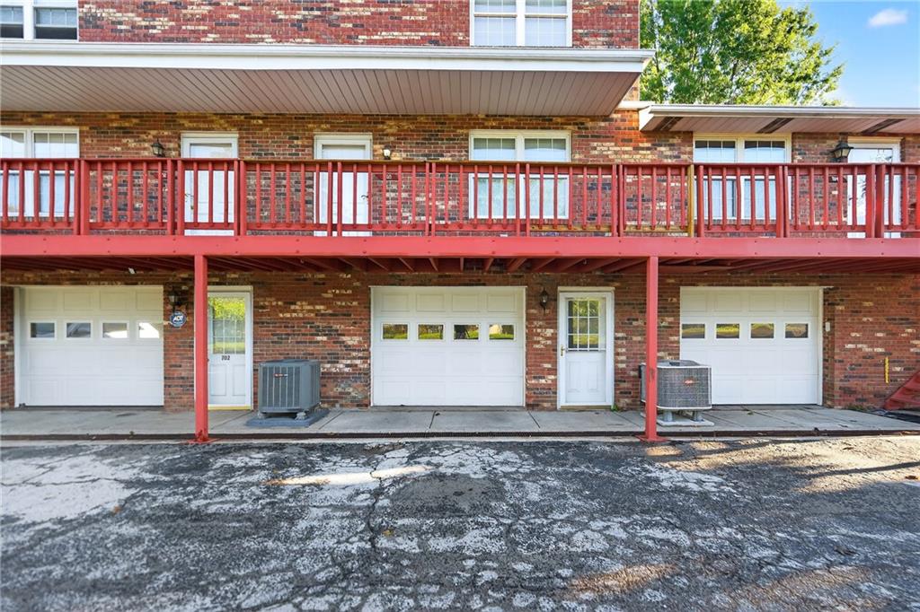 2902 Darlington Road, Unit 703 Beaver Falls, PA 15010 - Photo 5 of 37 a front view of multi story residential apartment building with yard