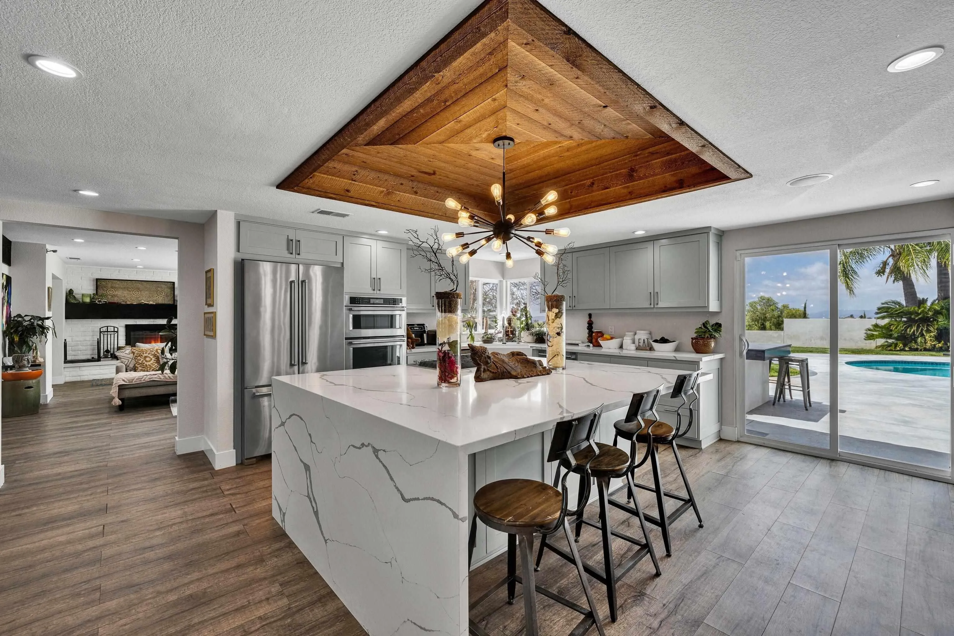 37389 Ave Chapala Temecula, CA 92592 - Photo 11 of 68 a view of a dining room with furniture and wooden floor