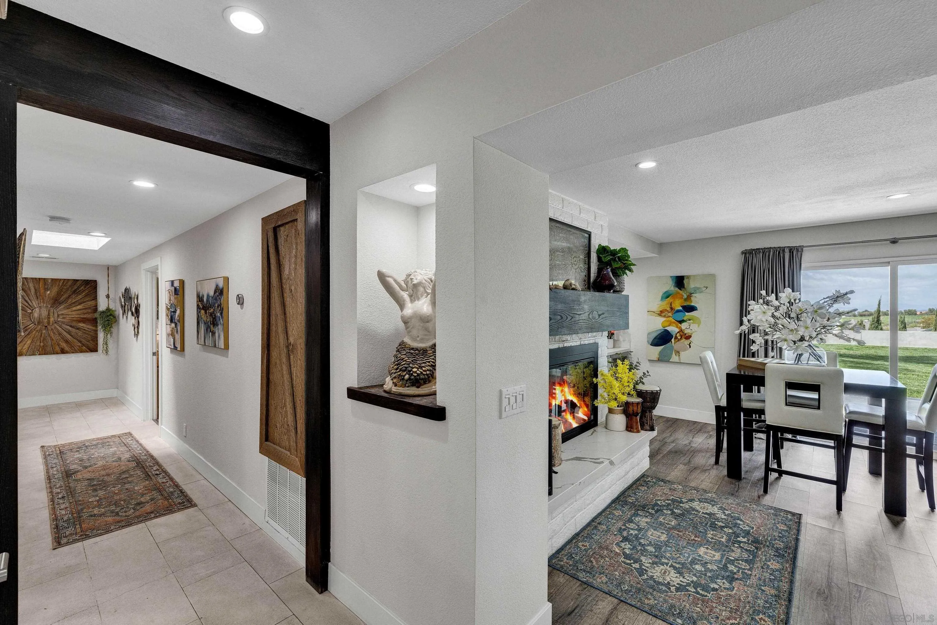 37389 Ave Chapala Temecula, CA 92592 - Photo 13 of 68 a living room with furniture and a book shelf