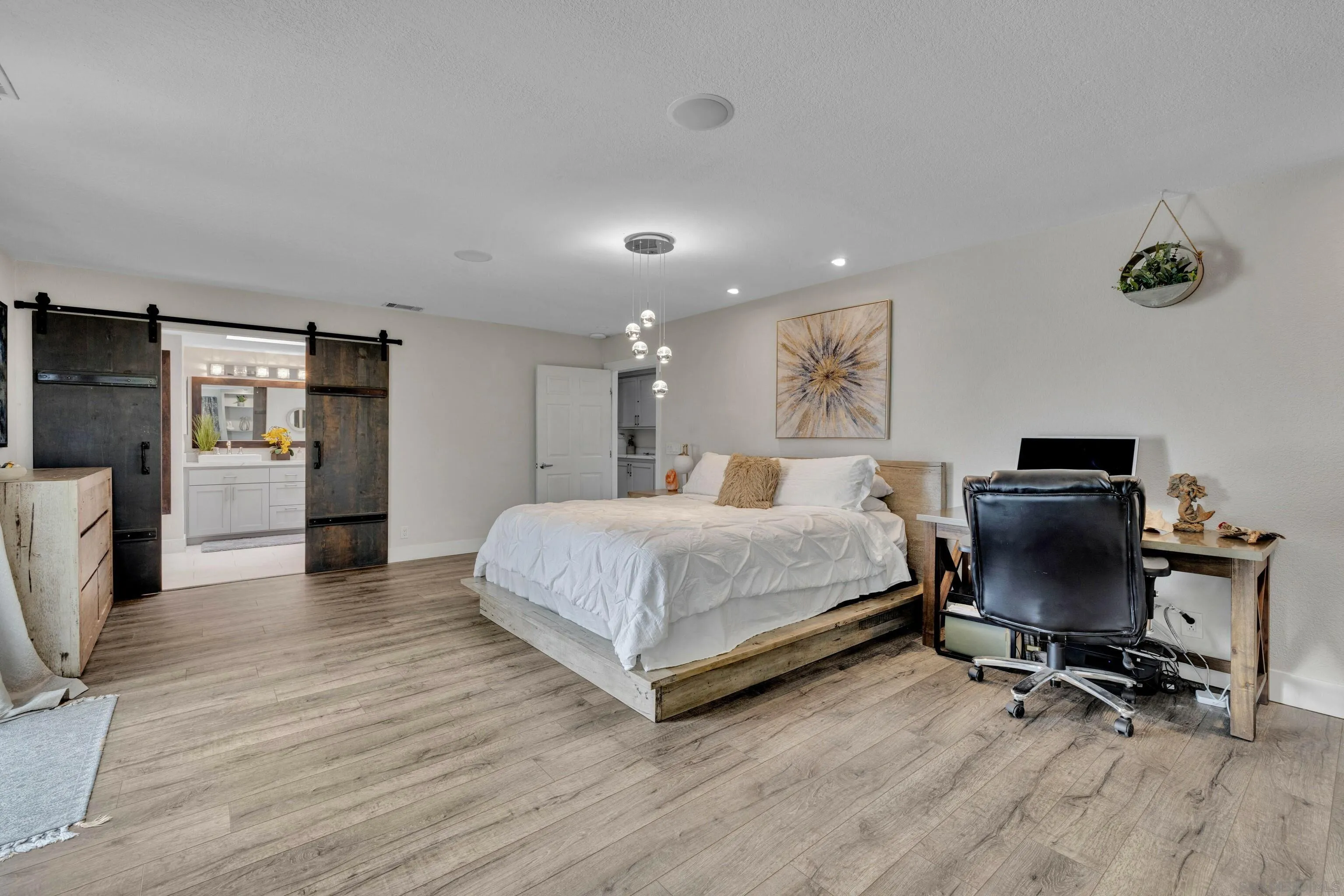 37389 Ave Chapala Temecula, CA 92592 - Photo 16 of 68 a bedroom with a bed and a chair