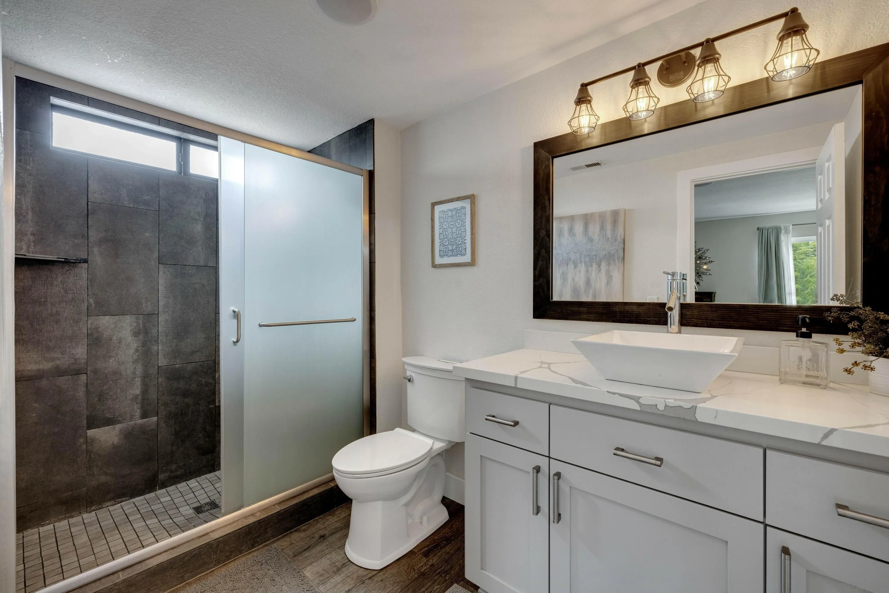 37389 Ave Chapala Temecula, CA 92592 - Photo 25 of 68 a bathroom with a sink a toilet and shower
